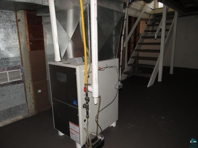 701 N 22nd St, Superior, WI 54880 - utility room with heating unit