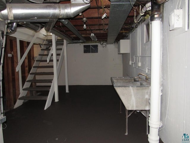 701 N 22nd St, Superior, WI 54880 - unfinished below grade area with stairway and a sink