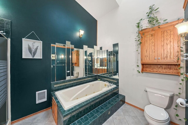 1420 Hidden Fields Dr, West Bend, WI 53095 - bathroom featuring high vaulted ceiling, toilet, a whirlpool tub, baseboards, and tile patterned floors