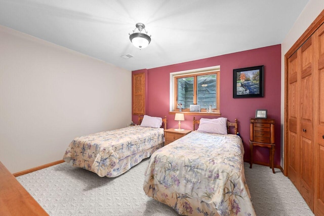 1420 Hidden Fields Dr, West Bend, WI 53095 - carpeted bedroom featuring a closet and baseboards