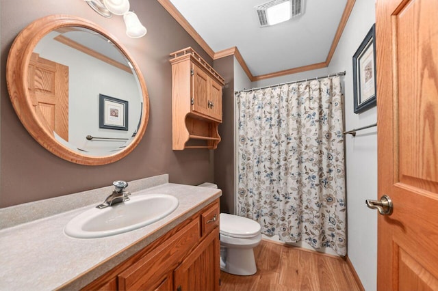 1420 Hidden Fields Dr, West Bend, WI 53095 - full bath featuring crown molding, vanity, toilet, wood finished floors, and a shower with shower curtain