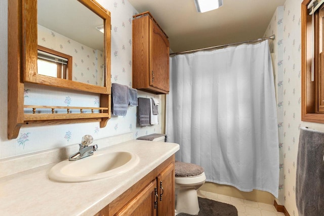 557 Center St, Berlin, WI 54923 - bathroom with wallpapered walls, toilet, vanity, and a shower with curtain