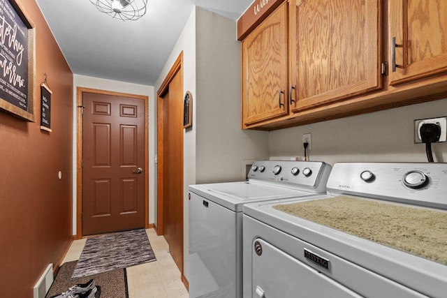 557 Center St, Berlin, WI 54923 - washroom with independent washer and dryer, cabinet space, baseboards, and light flooring