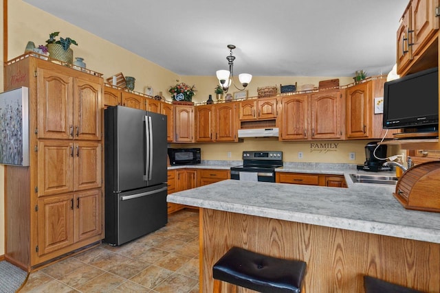 557 Center St, Berlin, WI 54923 - kitchen featuring freestanding refrigerator, electric stove, under cabinet range hood, a sink, and black microwave