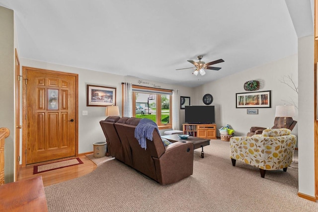 557 Center St, Berlin, WI 54923 - living area featuring a ceiling fan, baseboards, and light colored carpet