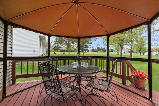 557 Center St, Berlin, WI 54923 - deck with outdoor dining area and a yard