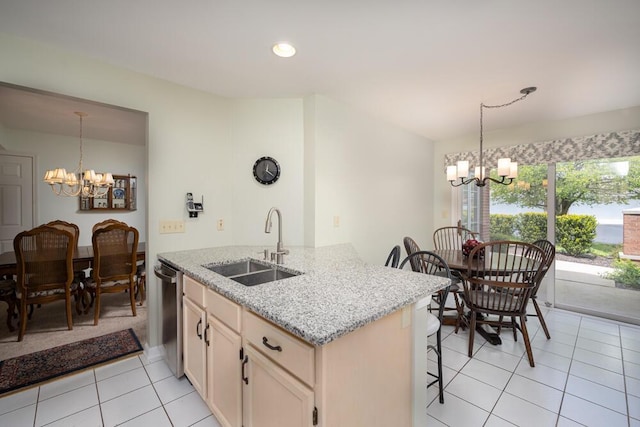 8707 Westlake Dr, Greendale, WI 53129 - kitchen with a chandelier, a sink, light tile patterned flooring, dishwasher, and light stone counters