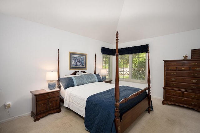 8707 Westlake Dr, Greendale, WI 53129 - bedroom featuring light colored carpet, baseboards, and vaulted ceiling