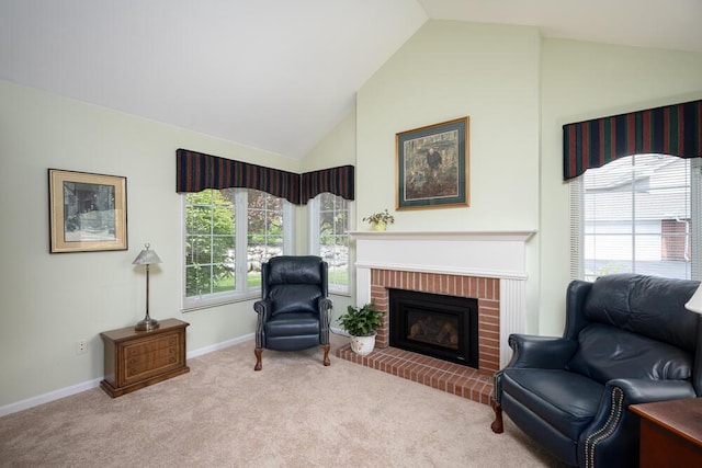 8707 Westlake Dr, Greendale, WI 53129 - living area with carpet floors, baseboards, a fireplace, and high vaulted ceiling