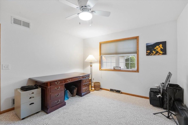 119 Summit Ct, Columbus, WI 53925 - home office featuring light colored carpet, ceiling fan, and baseboards