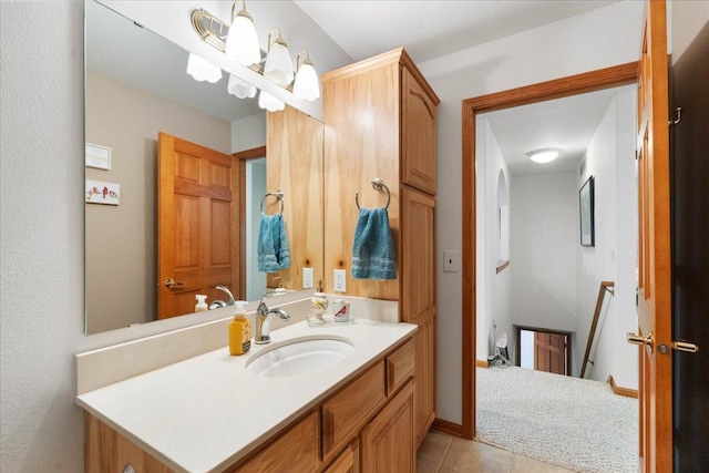 119 Summit Ct, Columbus, WI 53925 - bathroom with vanity and tile patterned flooring