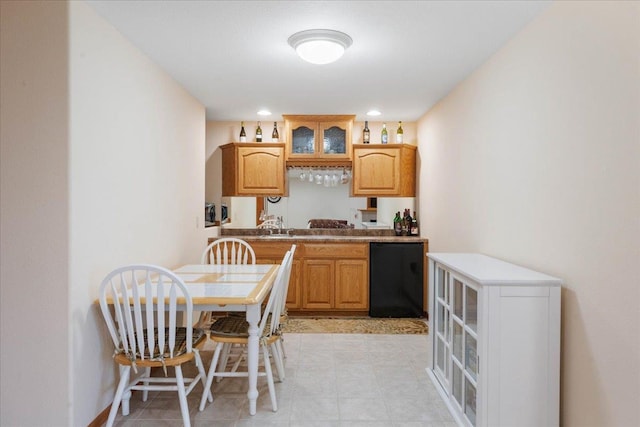 119 Summit Ct, Columbus, WI 53925 - kitchen with glass insert cabinets and recessed lighting