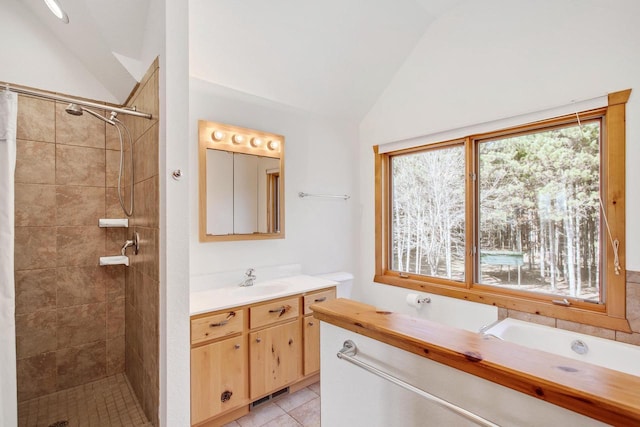 W5271 Southview Dr, Necedah, WI 54646 - bathroom with vaulted ceiling, vanity, a tile shower, tile patterned flooring, and a tub