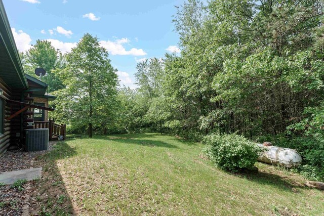 W5271 Southview Dr, Necedah, WI 54646 - view of grassy yard with central air condition unit
