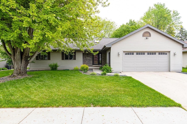 1074 Pendleton Rd, Neenah, WI 54956 - ranch-style house with a garage, driveway, and a front yard