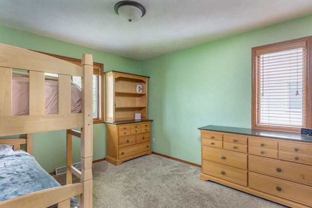 1074 Pendleton Rd, Neenah, WI 54956 - bedroom with light carpet and baseboards