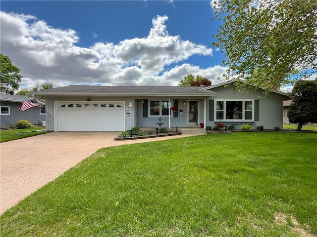 709 E Fillmore Ave, Eau Claire, WI 54701 - ranch-style house featuring an attached garage, concrete driveway, and a front lawn
