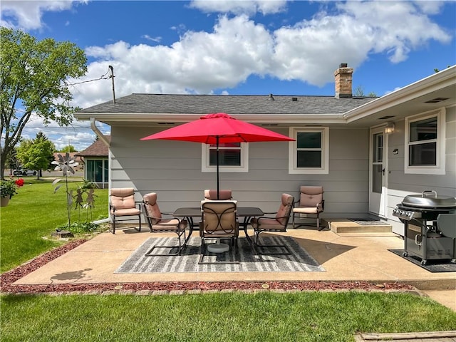 709 E Fillmore Ave, Eau Claire, WI 54701 - view of patio featuring a grill