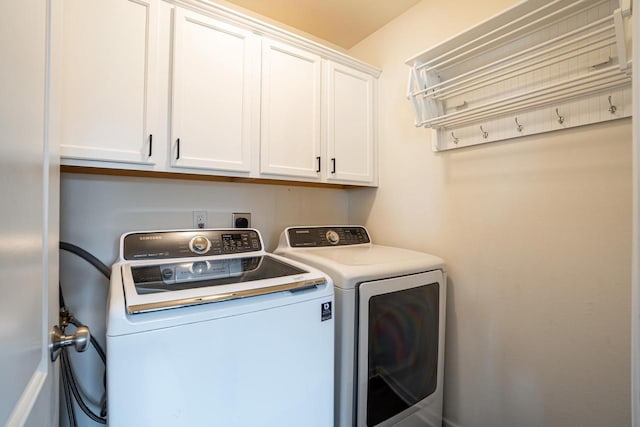 6544 Biscayne Ave, Mount Pleasant, WI 53406 - washroom featuring washing machine and clothes dryer and cabinet space