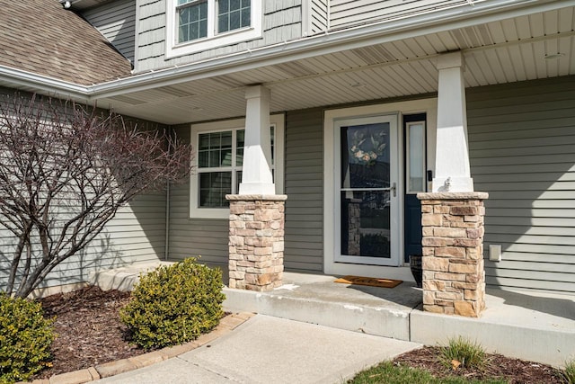 6544 Biscayne Ave, Mount Pleasant, WI 53406 - doorway to property featuring a porch and roof with shingles