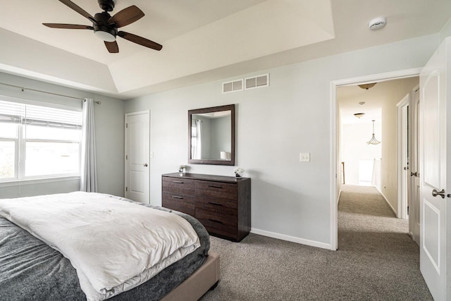 6544 Biscayne Ave, Mount Pleasant, WI 53406 - bedroom with carpet floors, a raised ceiling, baseboards, and ceiling fan