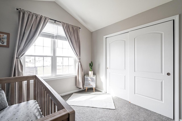 6544 Biscayne Ave, Mount Pleasant, WI 53406 - bedroom featuring carpet, vaulted ceiling, multiple windows, baseboards, and a closet