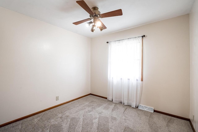 3324 96th St, Sturtevant, WI 53177 - unfurnished room with light colored carpet, baseboards, and ceiling fan