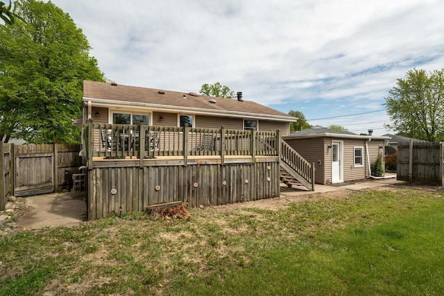 3324 96th St, Sturtevant, WI 53177 - back of house featuring a wooden deck, an outdoor structure, and stairway
