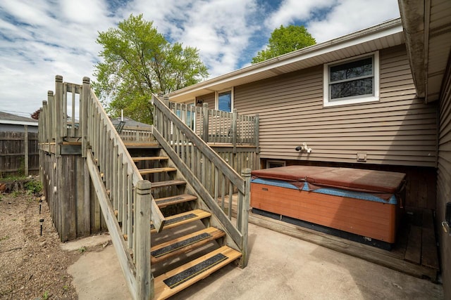 3324 96th St, Sturtevant, WI 53177 - wooden deck with a hot tub, stairs, and a patio