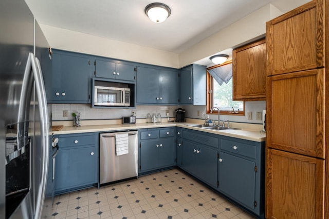 3324 96th St, Sturtevant, WI 53177 - kitchen with stainless steel appliances, a sink, light countertops, and light flooring