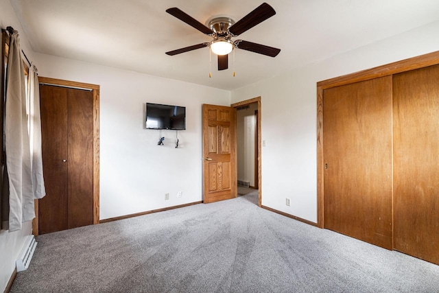 3324 96th St, Sturtevant, WI 53177 - unfurnished bedroom with carpet floors, baseboards, a baseboard heating unit, and ceiling fan