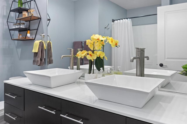 1930 Waterview Blvd, Plover, WI 54467 - bathroom with double vanity and curtained shower