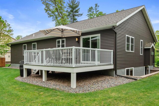 1930 Waterview Blvd, Plover, WI 54467 - rear view of house featuring a wooden deck, a yard, and a shingled roof