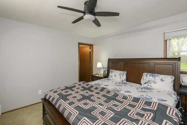 10065 S Cindy Ln, Oak Creek, WI 53154 - bedroom with light colored carpet, baseboards, and a ceiling fan