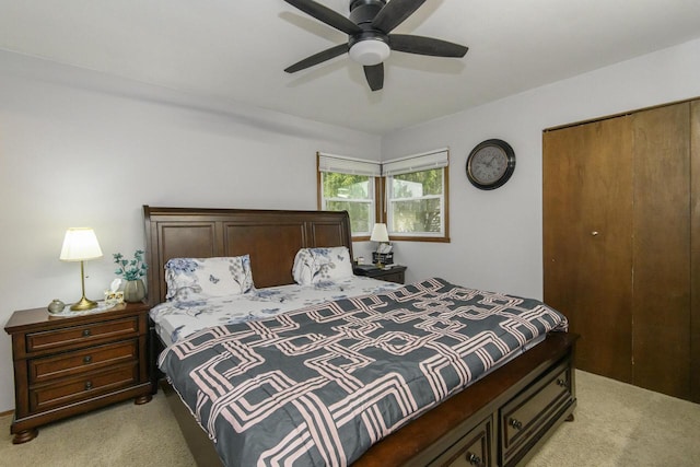 10065 S Cindy Ln, Oak Creek, WI 53154 - bedroom featuring light colored carpet, a closet, and ceiling fan