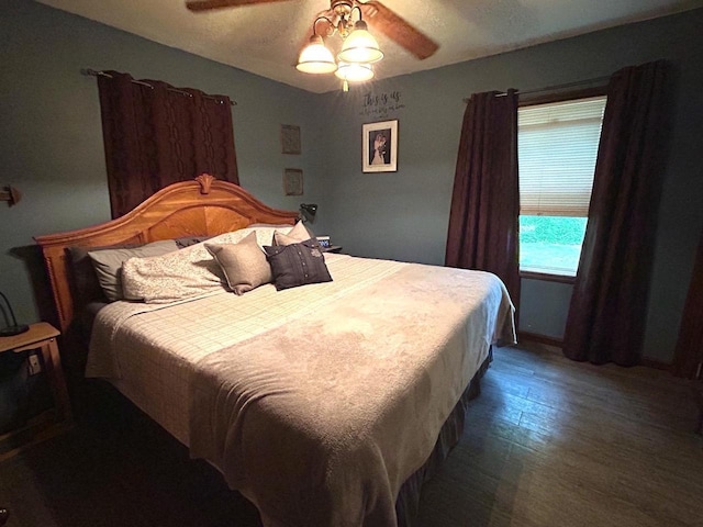2621 Golf Course Rd, Wisconsin Rapids, WI 54494 - bedroom featuring wood finished floors and ceiling fan