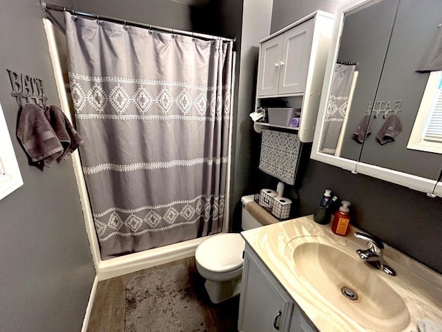 2621 Golf Course Rd, Wisconsin Rapids, WI 54494 - bathroom with vanity, toilet, and a shower with curtain