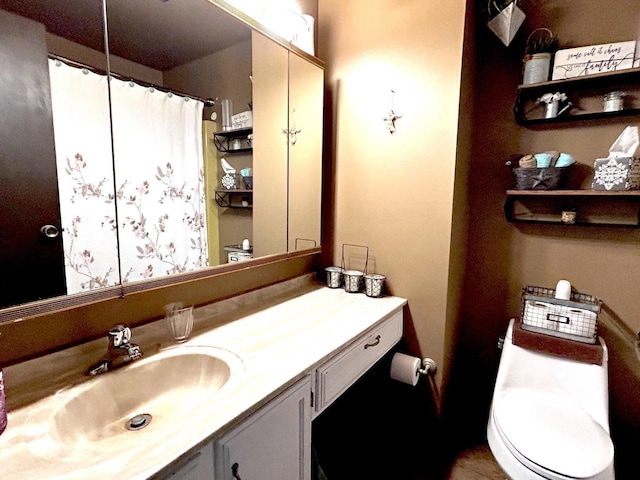 2621 Golf Course Rd, Wisconsin Rapids, WI 54494 - bathroom featuring toilet and vanity