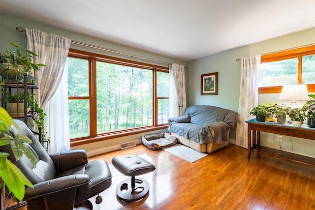 503 N 43rd Ave, Wausau, WI 54401 - living area with healthy amount of natural light, wood finished floors, and baseboards