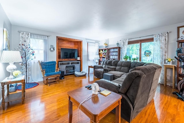 503 N 43rd Ave, Wausau, WI 54401 - living room with healthy amount of natural light, light wood-type flooring, and a fireplace