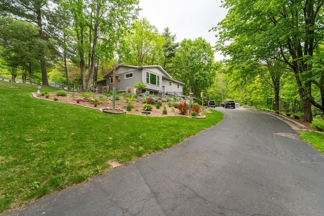 503 N 43rd Ave, Wausau, WI 54401 - view of side of property featuring a lawn