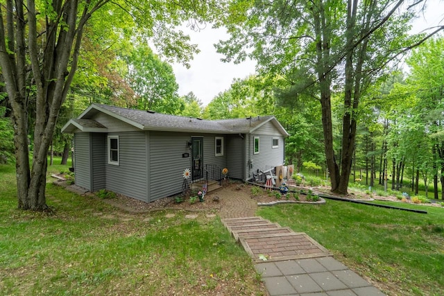 503 N 43rd Ave, Wausau, WI 54401 - back of house featuring a lawn