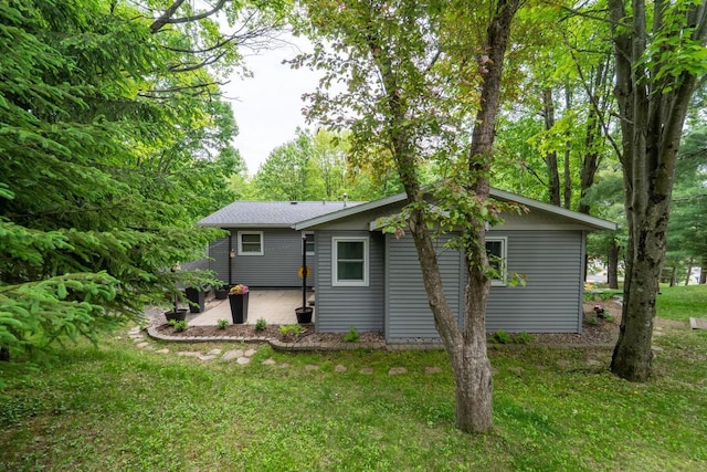 503 N 43rd Ave, Wausau, WI 54401 - rear view of house with a patio area and a yard