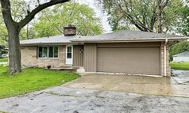 5404 N Bethmaur Ln, Milwaukee, WI 53209 - ranch-style house featuring a chimney, driveway, an attached garage, stone siding, and a front lawn