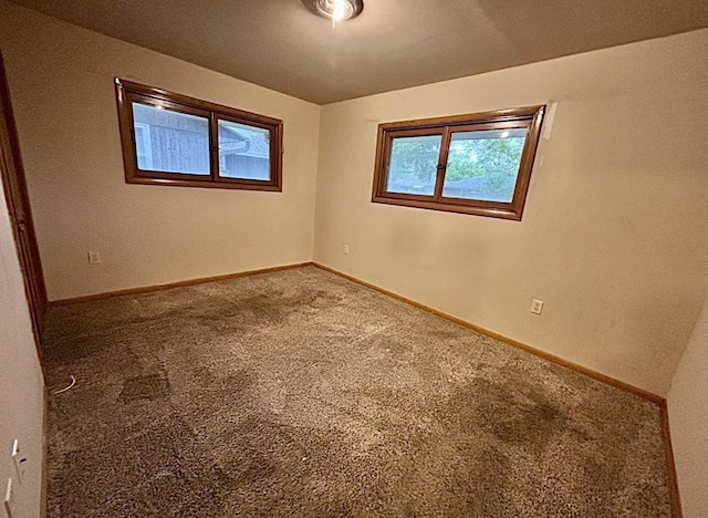 5404 N Bethmaur Ln, Milwaukee, WI 53209 - carpeted empty room with baseboards