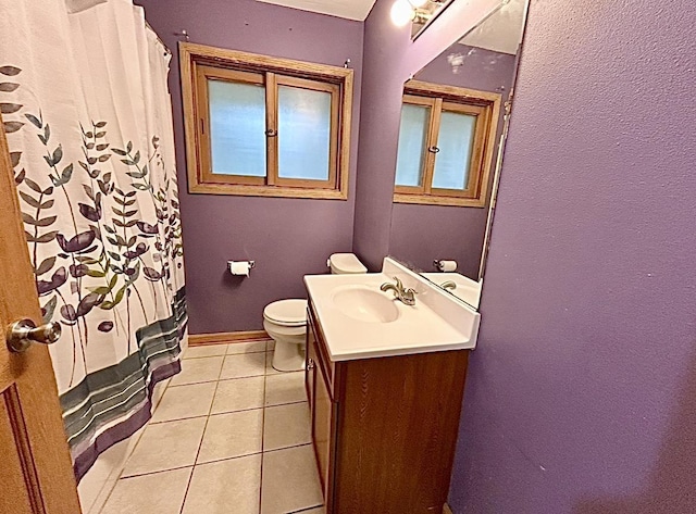 5404 N Bethmaur Ln, Milwaukee, WI 53209 - full bathroom with vanity, tile patterned floors, toilet, and a shower with shower curtain
