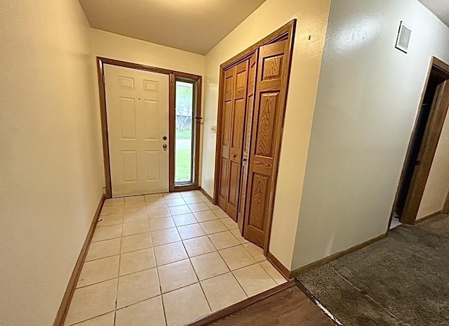 5404 N Bethmaur Ln, Milwaukee, WI 53209 - foyer with baseboards and light tile patterned floors