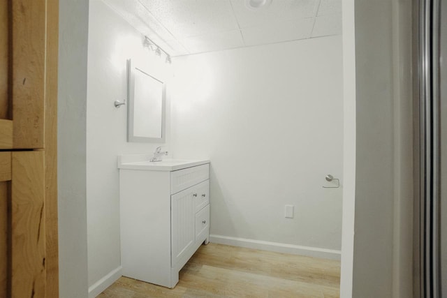 85 N Reserve Ave, Fond Du Lac, WI 54935 - bathroom featuring vanity, wood finished floors, and baseboards