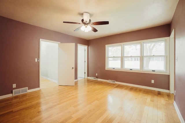 85 N Reserve Ave, Fond Du Lac, WI 54935 - unfurnished room with ceiling fan, light wood finished floors, and baseboards