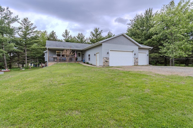 5304 Ski Ln, Weston, WI 54476 - ranch-style house with a garage, a front yard, driveway, and covered porch